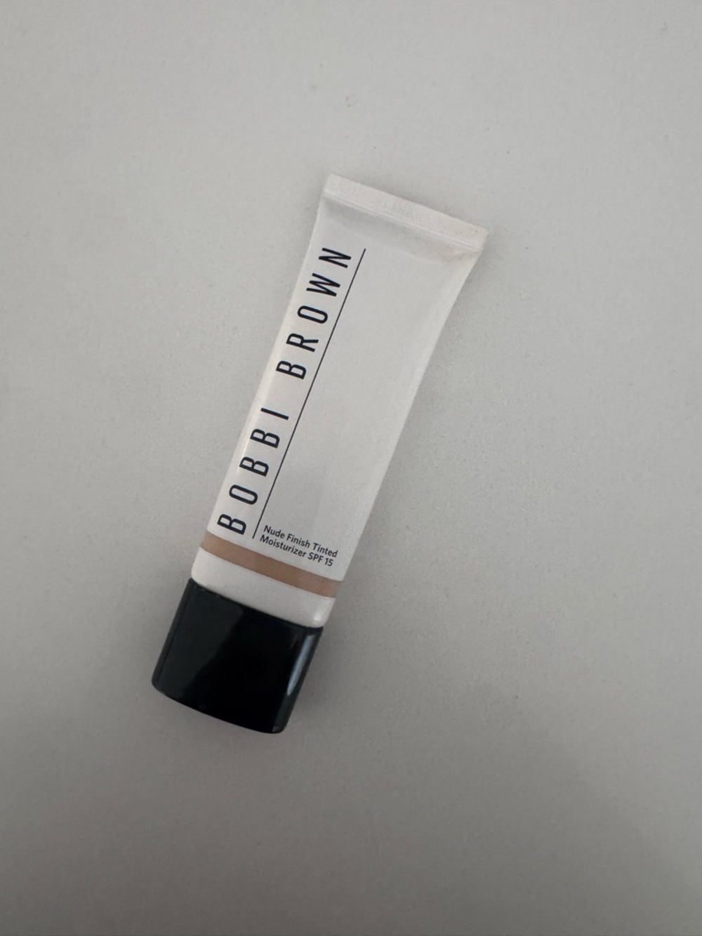 Bobbi Brown Nude Finish Tinted Moisturizer light to medium